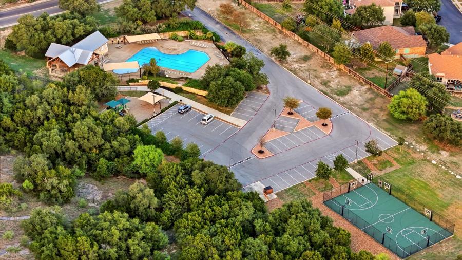 Aerial view of the community pool and sports court